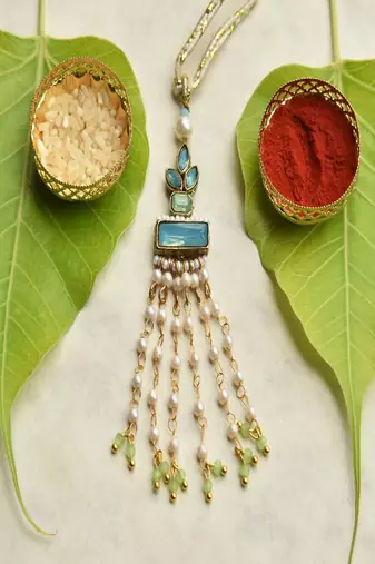Aqua blossom lumba with roli chawal capsules