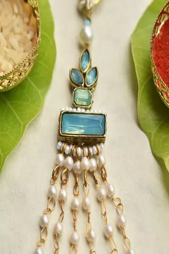 Aqua blossom lumba with roli chawal capsules
