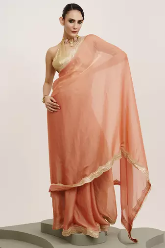 Embellished sequinned work peach satin rich ceremonial saree