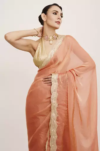 Embellished sequinned work peach satin rich ceremonial saree