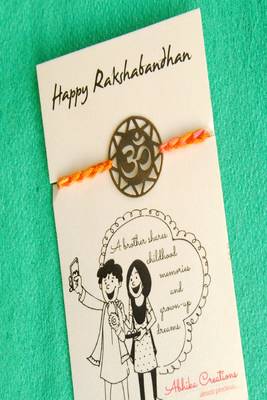 Om quirky rakhi with roli chawal capsules 2