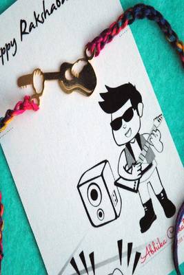Guitar quirky rakhi with roli chawal capsules 2