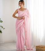 Pink color georgette fabric beautiful partywear embroidered saree