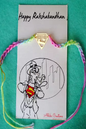 Super bhabhi quirky rakhi with roli chawal capsules