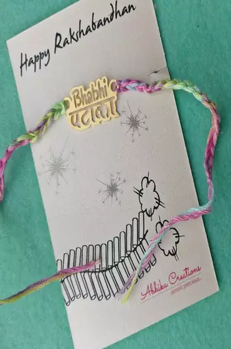 Bhabhi pataka quirky rakhi with roli chawal capsules