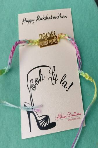 Nakhre waali bhabhi quirky rakhi with roli chawal capsules