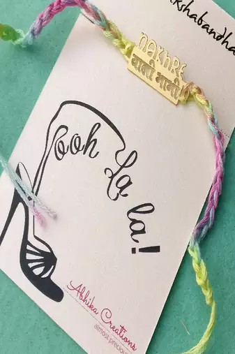 Nakhre waali bhabhi quirky rakhi with roli chawal capsules