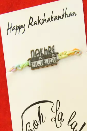 Nakhre waali bhabhi quirky rakhi with roli chawal capsules