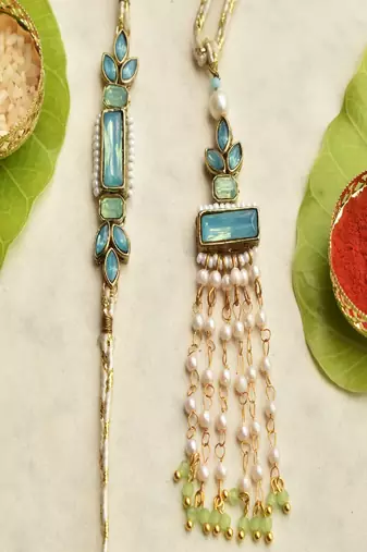Ocean bloom & aqua blossom rakhi-lumba set with roli chawal capsules