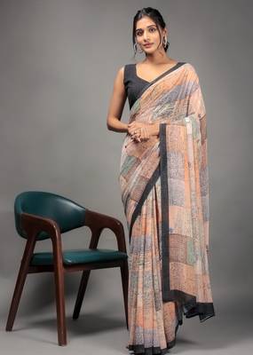 Orange color georgette fabric printed graceful ethnic saree 1
