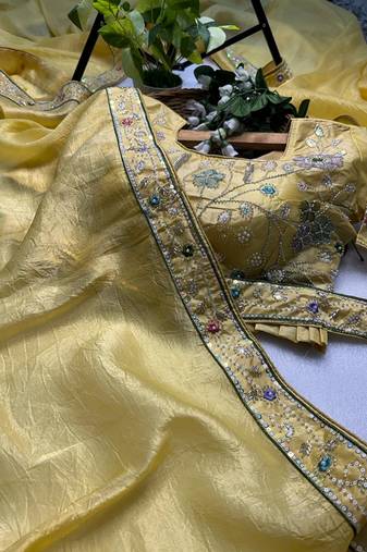 Yellow gold crunchy with thread and hand work saree with blouse