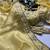 Yellow gold crunchy with thread and hand work saree with blouse