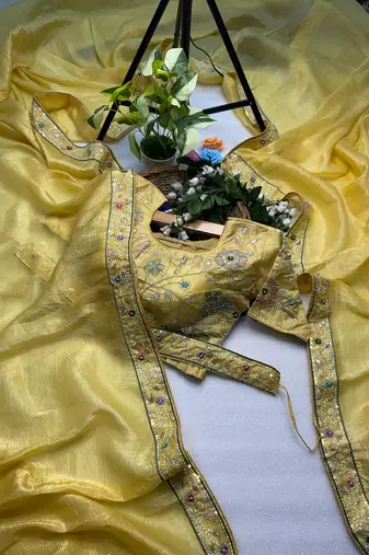 Yellow gold crunchy with thread and hand work saree with blouse