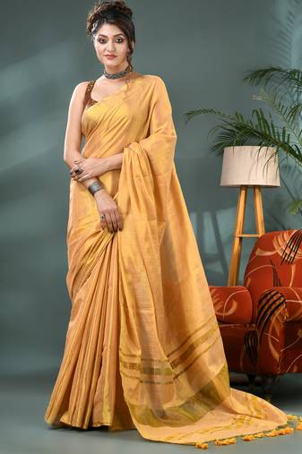 Gold soft linen tissue silk saree with blouse piece