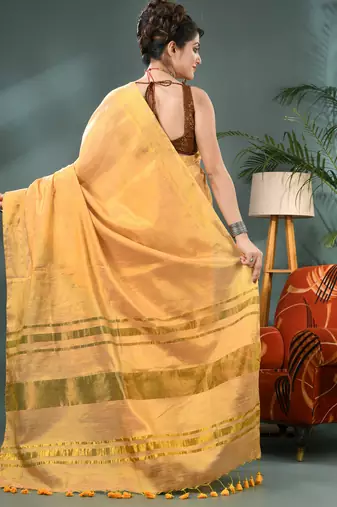 Gold soft linen tissue silk saree with blouse piece