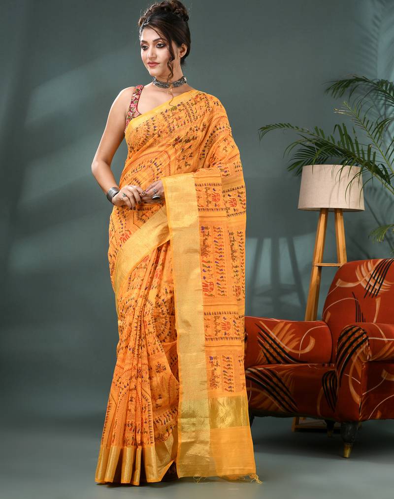 Yellow zari tribal print cotton silk saree with blouse piece