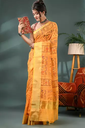 Yellow zari tribal print cotton silk saree with blouse piece