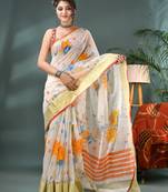 White cotton silk handloom floral batik print saree with blouse piece