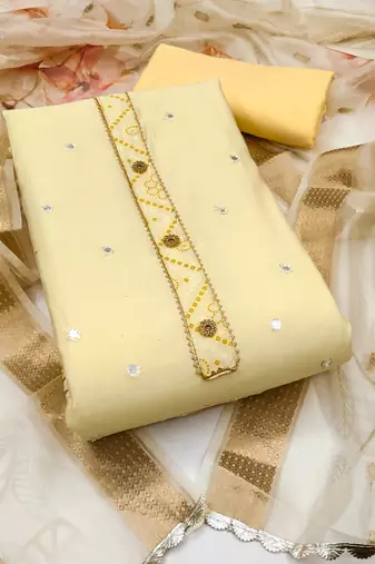 Women's light yellow unstitched embroiderd pure cotton silk dress material 