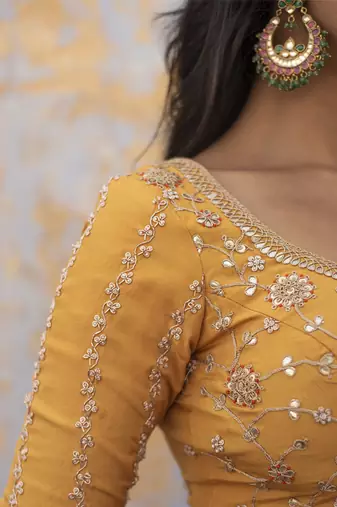 saffron embroidered silk Lehenga