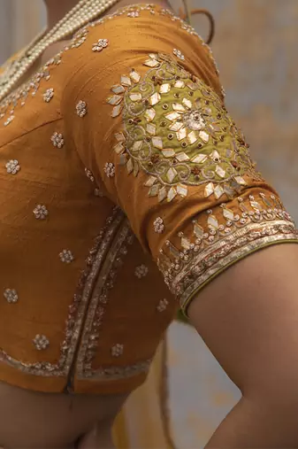 yellow embroidered silk Lehenga