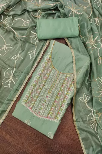 Women's sea green embroidered roamn cotton dress material