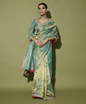 Turquoise printed tissue saree 1