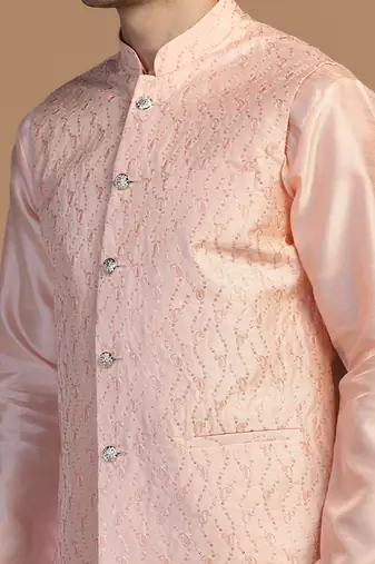 Peach kurta set with embroidered jacket for men