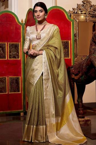 green thread embroidered jacquard silk blend saree