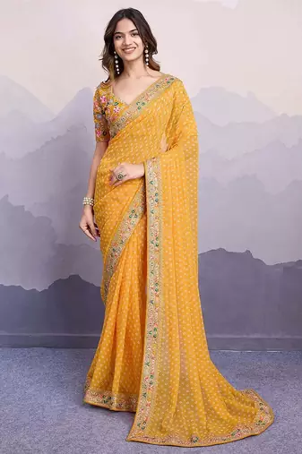 yellow bandhani printed saree with blouse