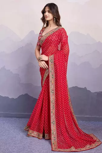red embroidered saree with blouse