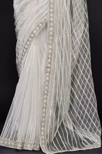 white sequin work net saree with blouse