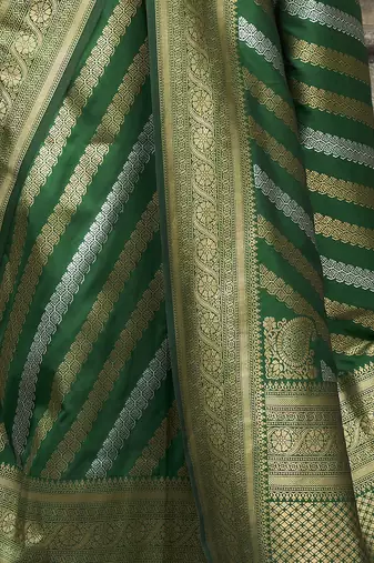 green zari weaving silk blend saree with blouse