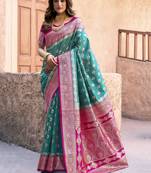 teal green zari weaving silk blend saree with blouse