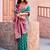 teal green zari weaving silk blend saree with blouse