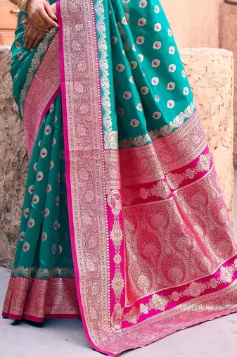 teal green zari weaving silk blend saree with blouse