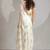Off white handwork zarkan border work satin silk party wear saree