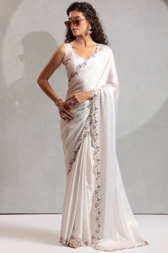 White heavy zarkan handwork satin georgette saree with blouse piece