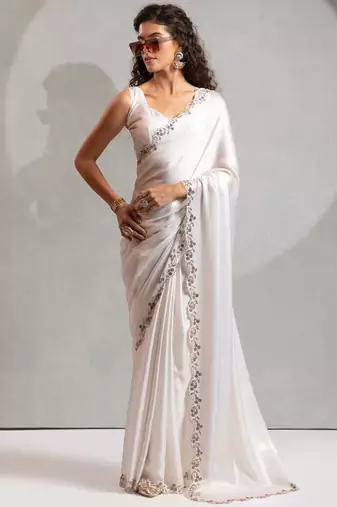 White heavy zarkan handwork satin georgette saree with blouse piece