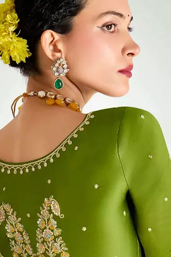 green organza border work saree with blouse