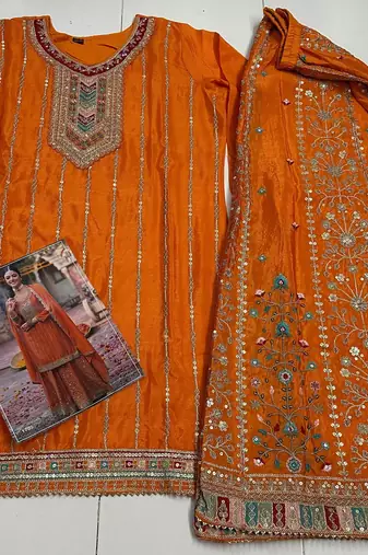 Orange free size full stitched upto 42 palazzo wedding suits