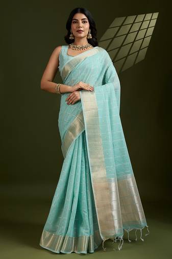 Sea green zari woven silk blend saree with contrast blouse