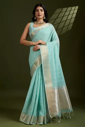 Sea green zari woven silk blend saree with contrast blouse