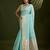 Sea green zari woven silk blend saree with contrast blouse