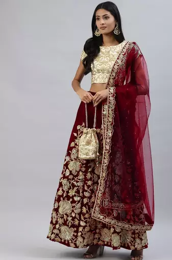 MAROON ZARI SEQUINS EMBROIDERED VELVET LEHENGA CHOLI