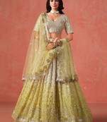 YELLOW GEORGETTE SEQUINS ZARI EMBROIDERED LEHENGA CHOLI