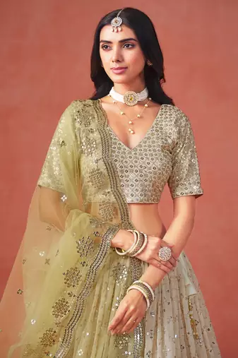 YELLOW GEORGETTE SEQUINS ZARI EMBROIDERED LEHENGA CHOLI