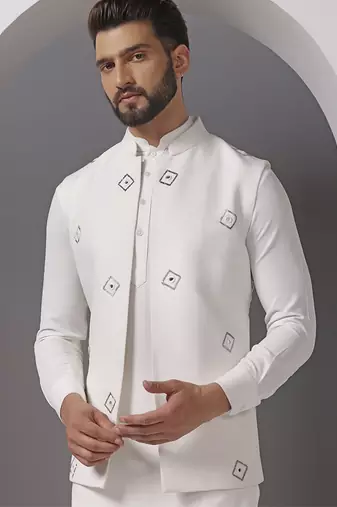 Ivory embroidered crepe kurta set with mirror ivory jacket