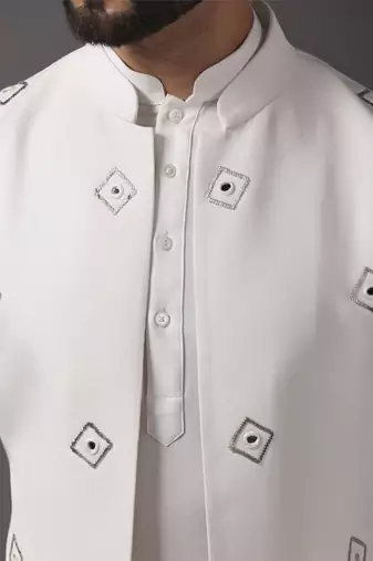 Ivory embroidered crepe kurta set with mirror ivory jacket