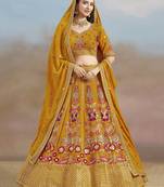YELLOW GEORGETTE SEQUINS THREAD ZARI EMBROIDERED LEHENGA CHOLI